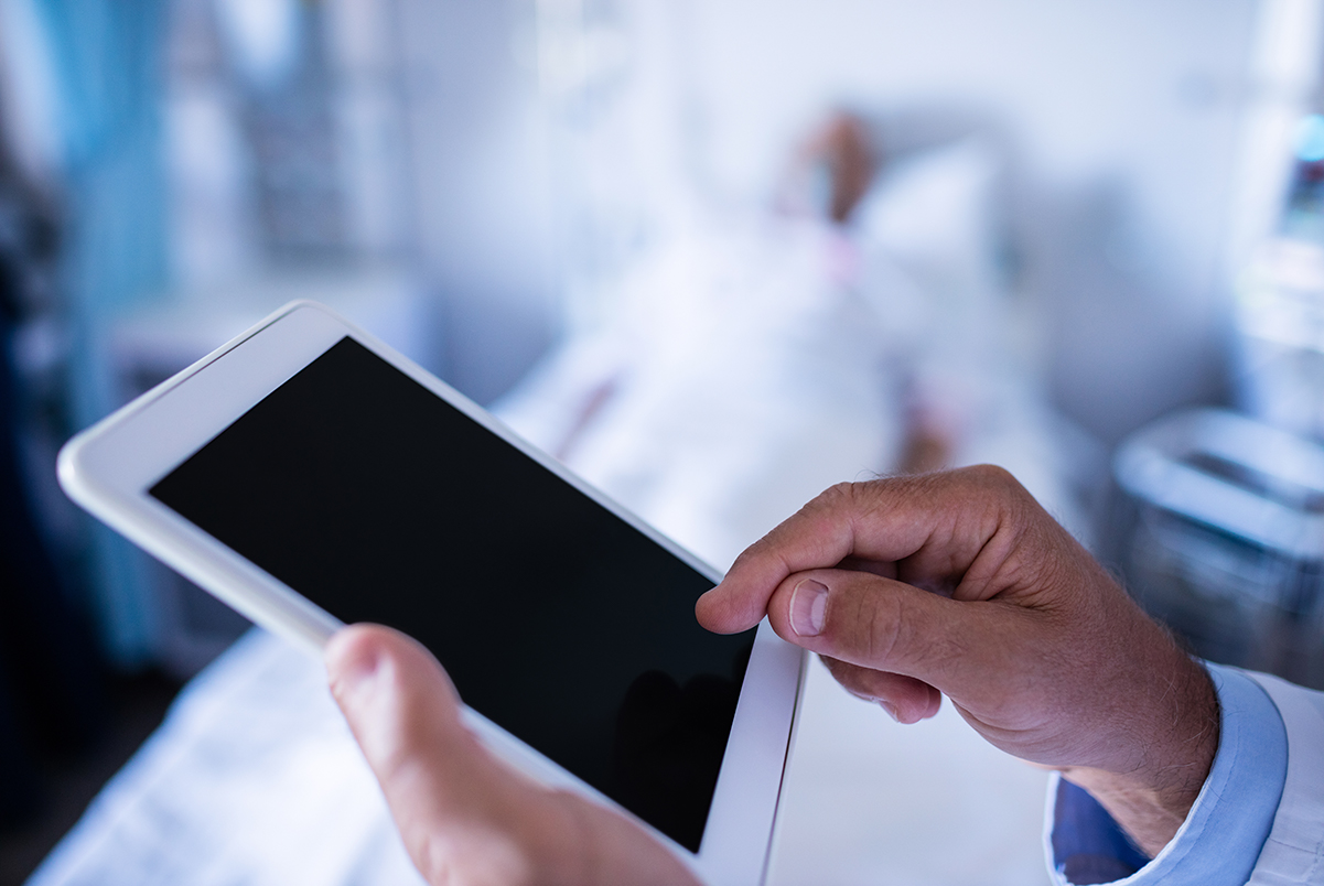 doctor-using-digital-tablet